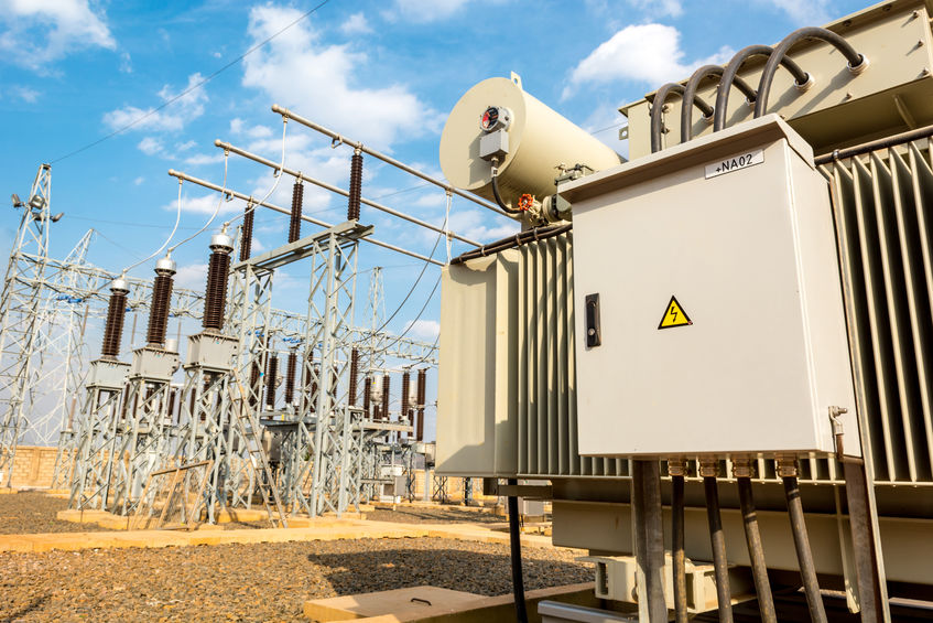 Power utility box on a power transformer in substation switchyard. Electrical transformer or switchyard. Power line and power substation. Power plant with transformer in the box. The head of the power supply. Power and electricity technology concept. Electricity transmission and substation. Power supply equipment and power boxes. Power distribution and transmission industry. Transport transformer and switchyard for utility mobility.